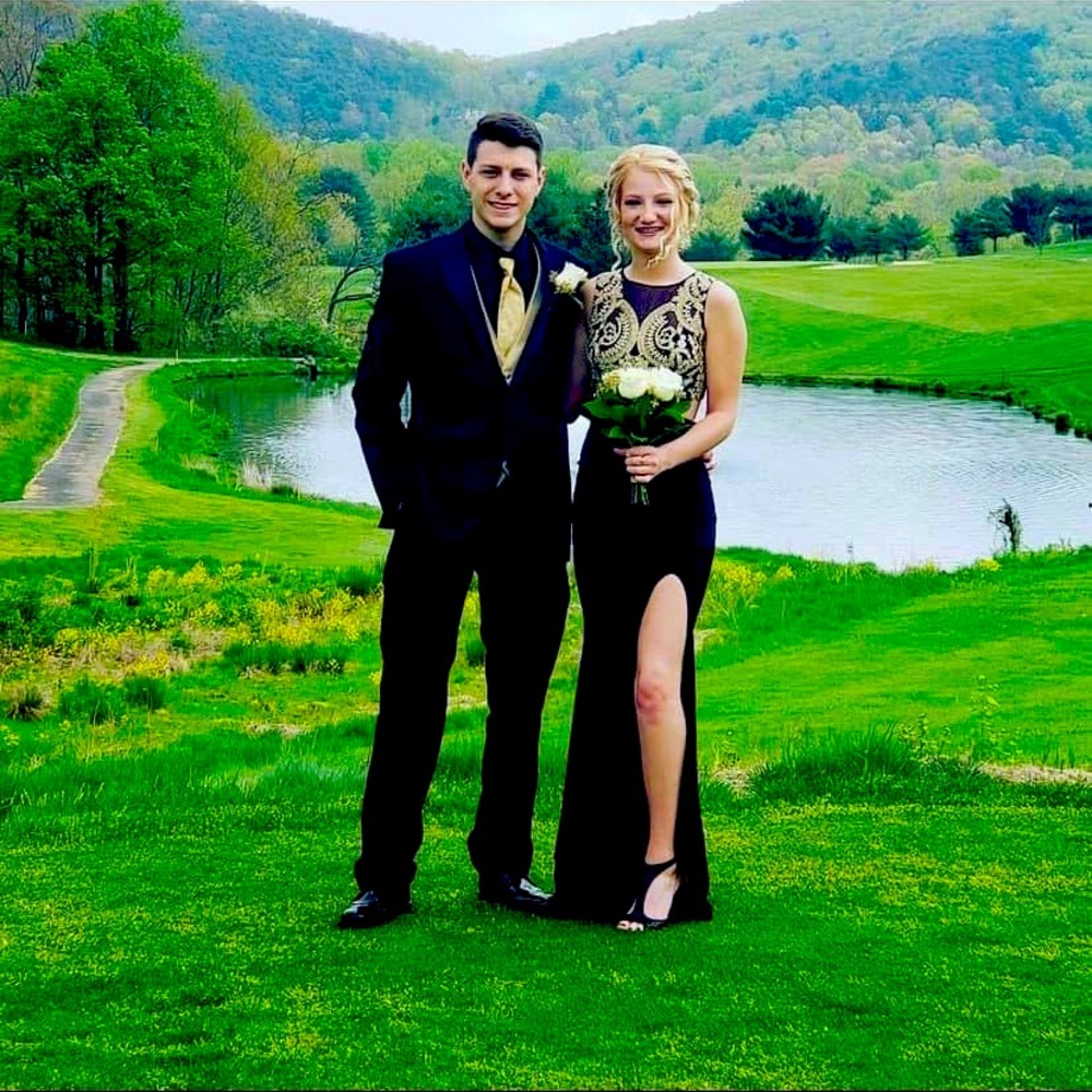 Beautiful black/gold prom gown.. worn once.. like new condition!